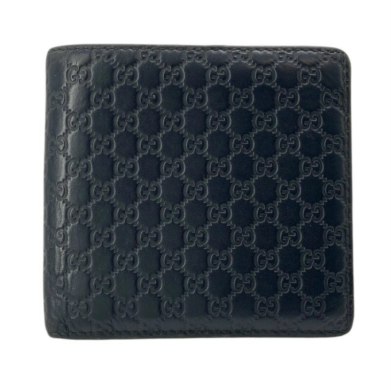 Front exterior of a black Gucci embossed cow leather men's bifold wallet.