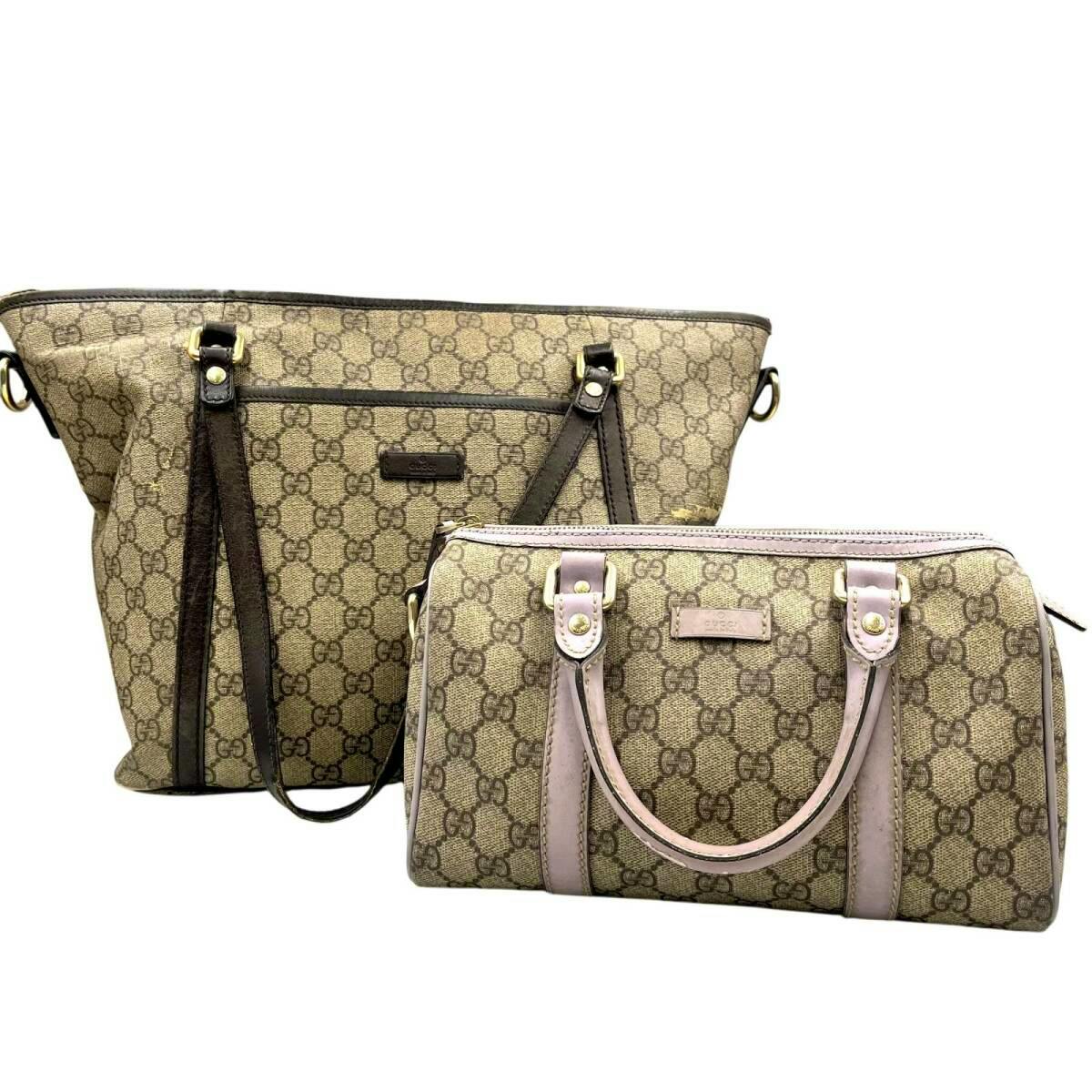 Two Gucci GG Supreme canvas bags: a larger tote in the background and a smaller mini Boston bag in front.