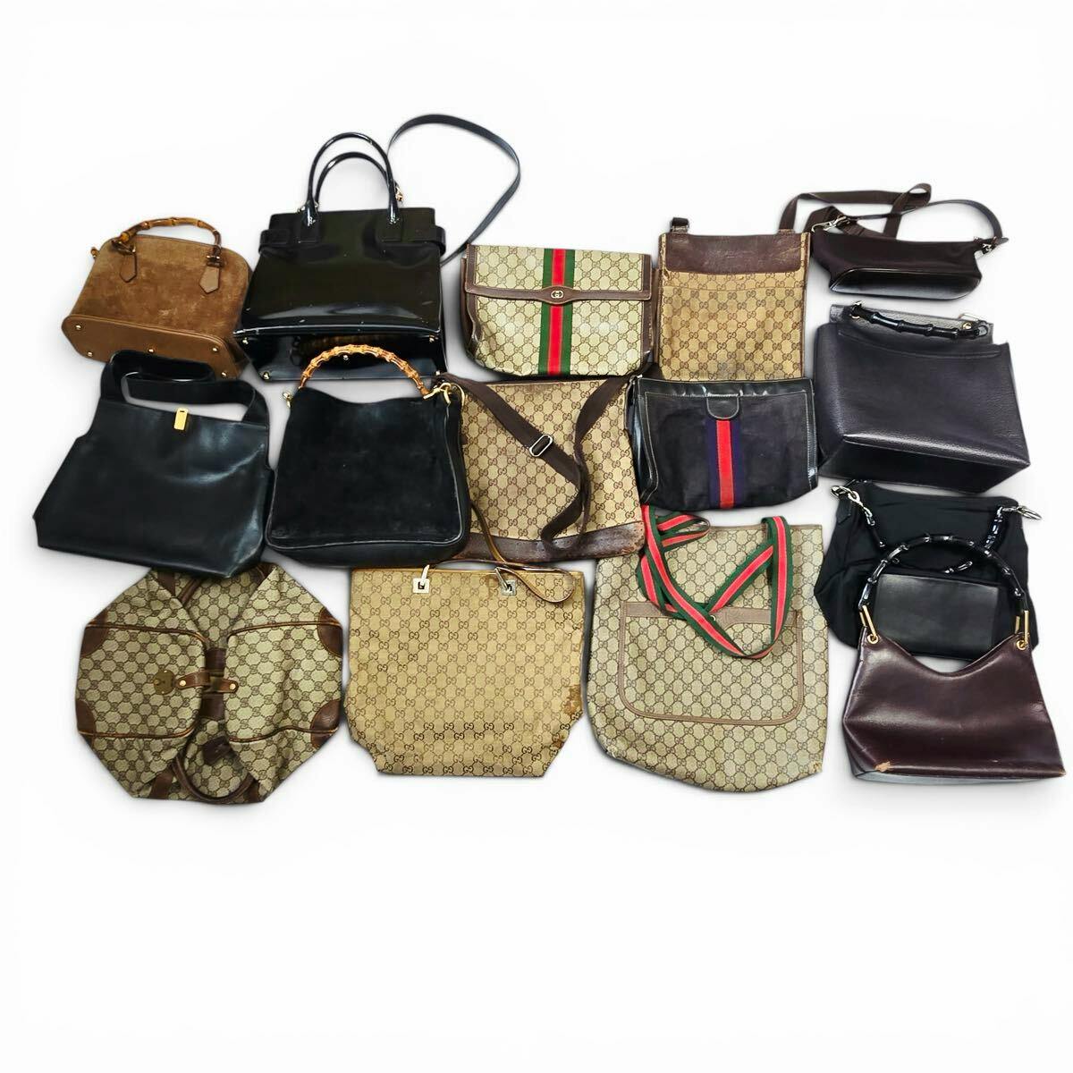 A laid-out bulk set of GUCCI bags and shoulder bags displayed on a white background.