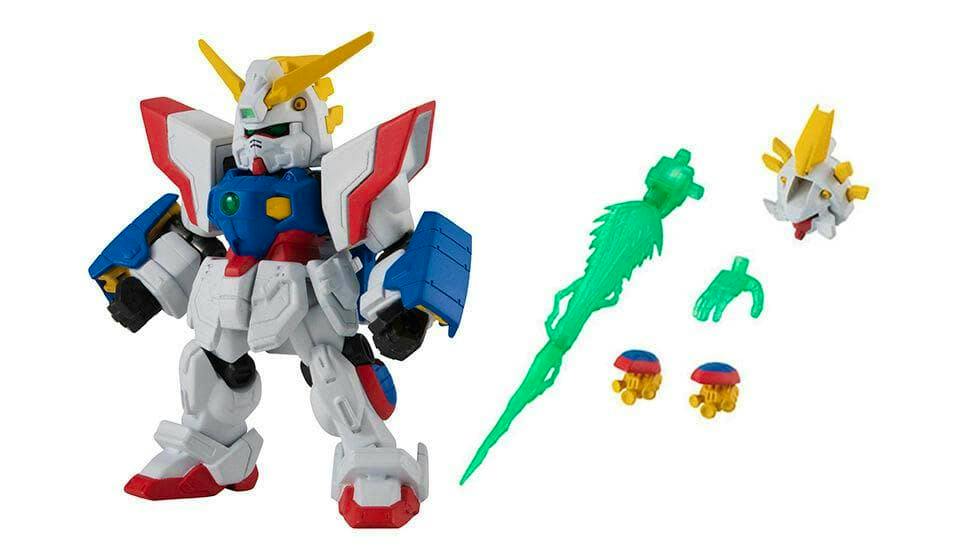 A small Shining Gundam figure with separate green effect blade and additional weapon and accessory parts on a white background.