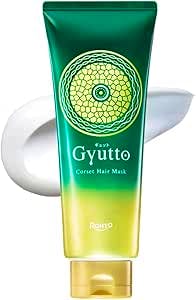 Green and yellow tube of Gyutto Corset Hair Mask with a white product smear behind it.