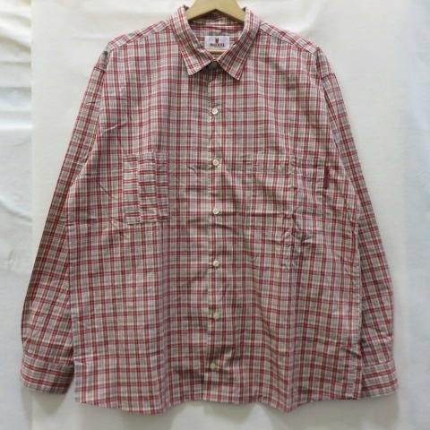 Front view of a men's check cotton shirt hanging on a hanger.