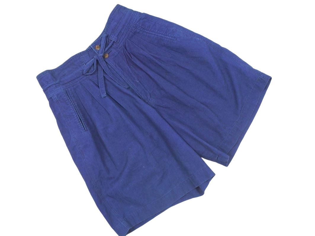 Blue women's half-length cotton shorts with a waist ribbon and tuck, laid flat on a white background.
