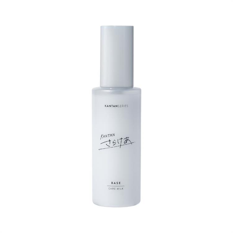 A white bottle of hair treatment milk with Japanese label characters on a plain white background.