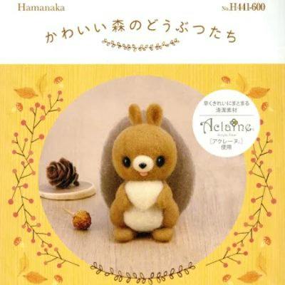 Product packaging front showing the finished felt squirrel mascot on a yellow decorative background.