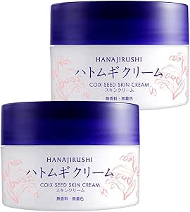 Two jars of Hanajirushi Coix Seed Skin Cream in white containers with purple lids.