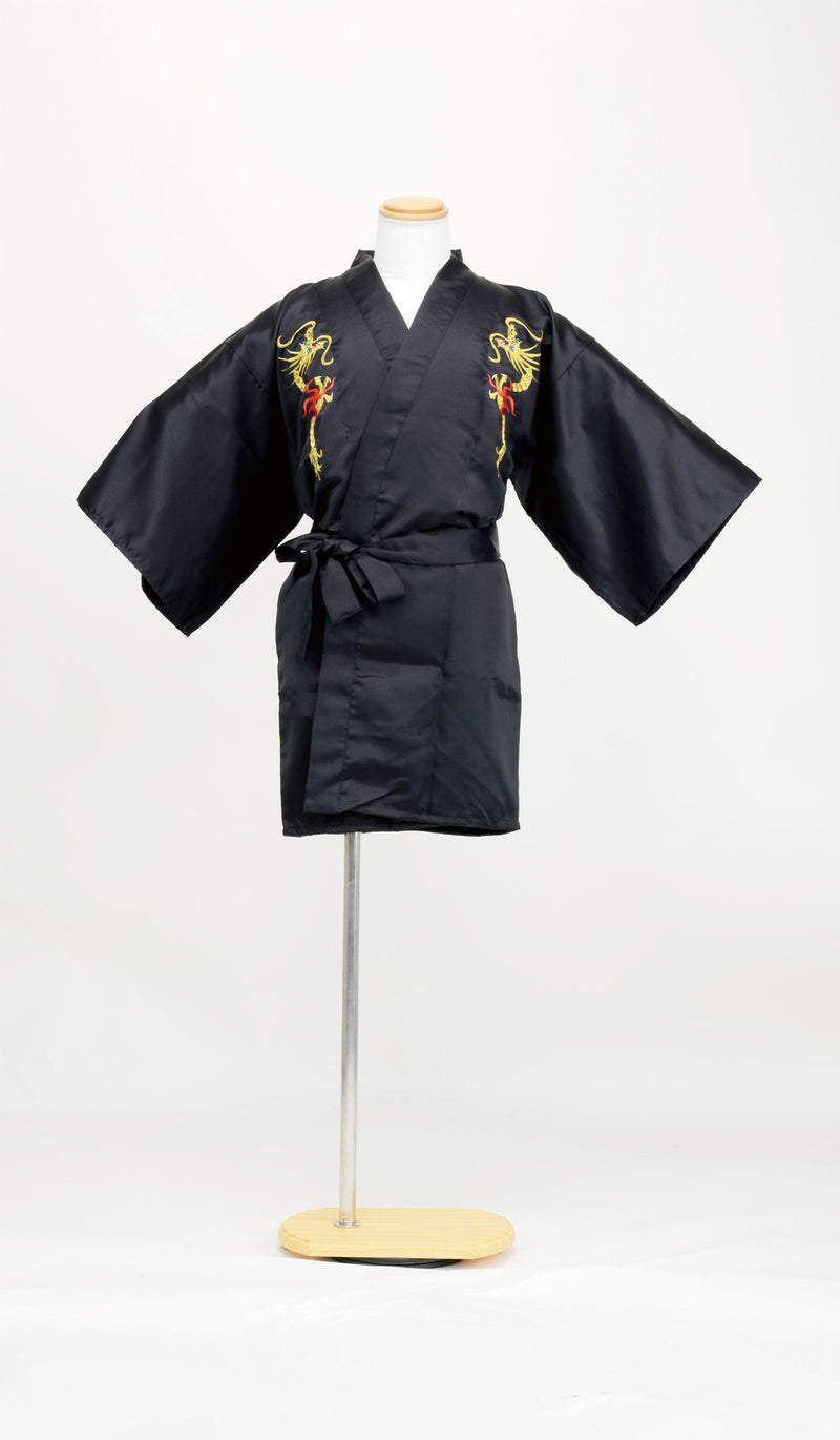 Front view of a black hanten with yellow and red flame dragon embroidery displayed on a mannequin.