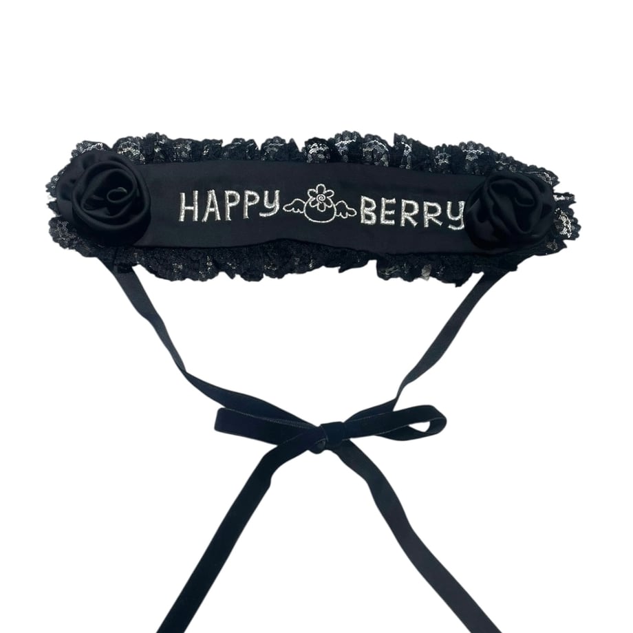 Black HAPPY BERRY headdress headband with lace trim, embroidered logo, two fabric roses, and long ribbon ties.