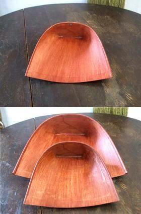 Top: a small wooden tray on a dark table; bottom: two similar wooden trays nested together.