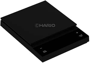 Black HARIO Coffee Scale Polaris shown at an angle, displaying the weighing platform and front control panel.