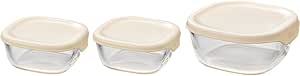 Three clear heat-resistant glass storage containers with white lids, shown in three sizes.