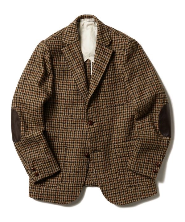 Front view of the men's Harris Tweed jacket with elbow patches laid flat against a white background.