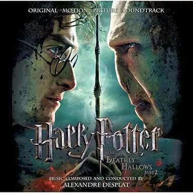 Cover art for the CD soundtrack of the film 'Harry Potter and the Deathly Hallows Part 2' showing Harry Potter and Voldemort facing each other and the title text.