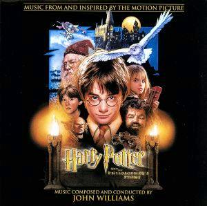 Cover art of the Harry Potter and the Philosopher's Stone original soundtrack showing Harry Potter's face, Hogwarts in the background, and the soundtrack title.