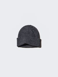 Gray cable-knit beanie hat with a folded cuff shown on a light background.