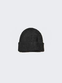 A black ribbed acrylic beanie displayed on a plain light background.