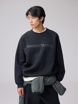 Model wearing the heavyweight wide straight sweat pants paired with a black sweatshirt.