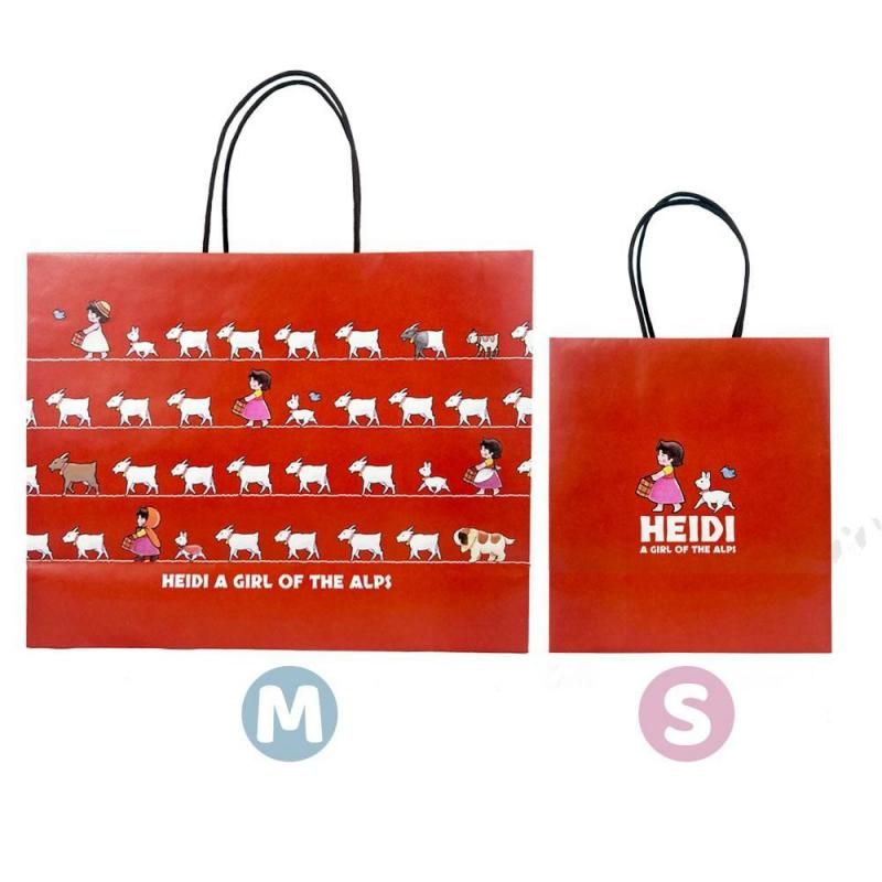 Two red Heidi paper bags (M and S sizes) showing illustrated Heidi and goat pattern with black handles.