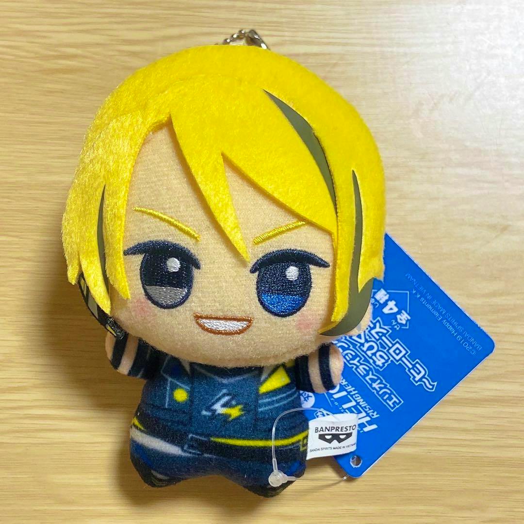 Front view of the エリオス chibi plush from エリオスライジングヒーローズ on a wooden background.