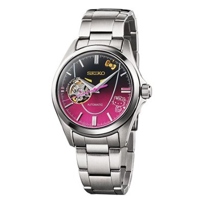 Studio image of the mechanical wristwatch showing a stainless-steel case and bracelet, pink-to-black gradient dial with an open-heart movement and Hello Kitty motif.