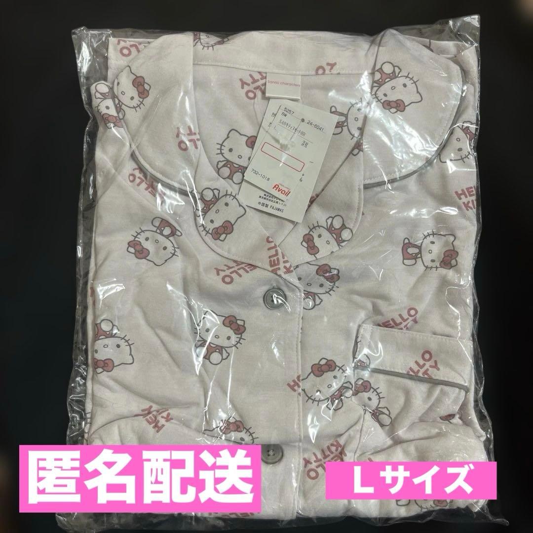 Folded Hello Kitty short-sleeve pajamas (L size) in clear plastic packaging with a visible product tag.