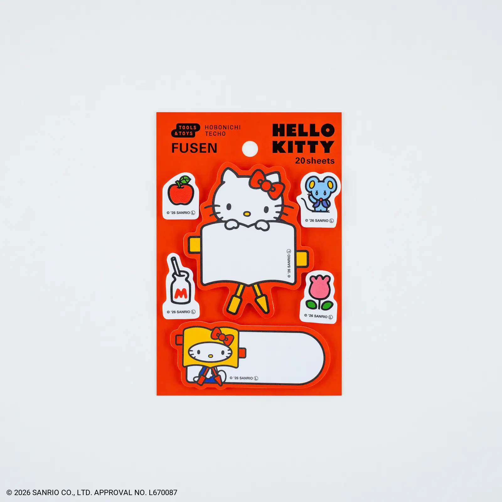 Packaged Hello Kitty sticky notes set on orange backing showing several shaped note pads.