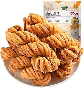 A plate of twisted cookies with the product packaging visible in the background.