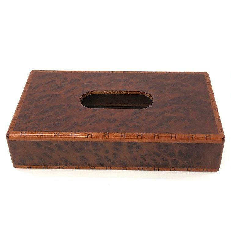 HERMES wooden rectangular tissue box with an oval opening and H-pattern wood grain finish.