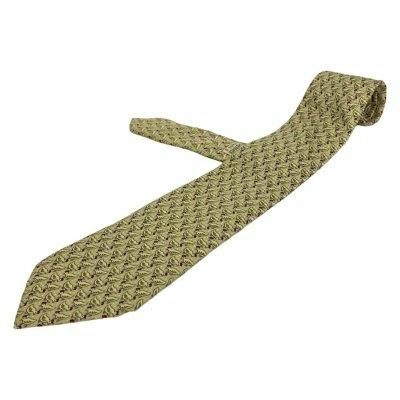 A patterned Hermès silk necktie laid flat with the narrow end overlapping the wider blade on a white background.