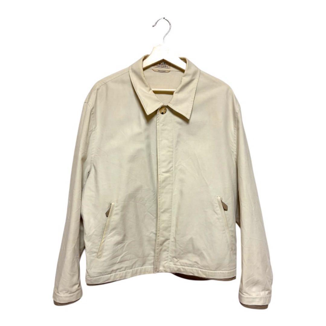 Front view of the HERMES men's cotton jacket (size 54) hanging on a white hanger against a white background.