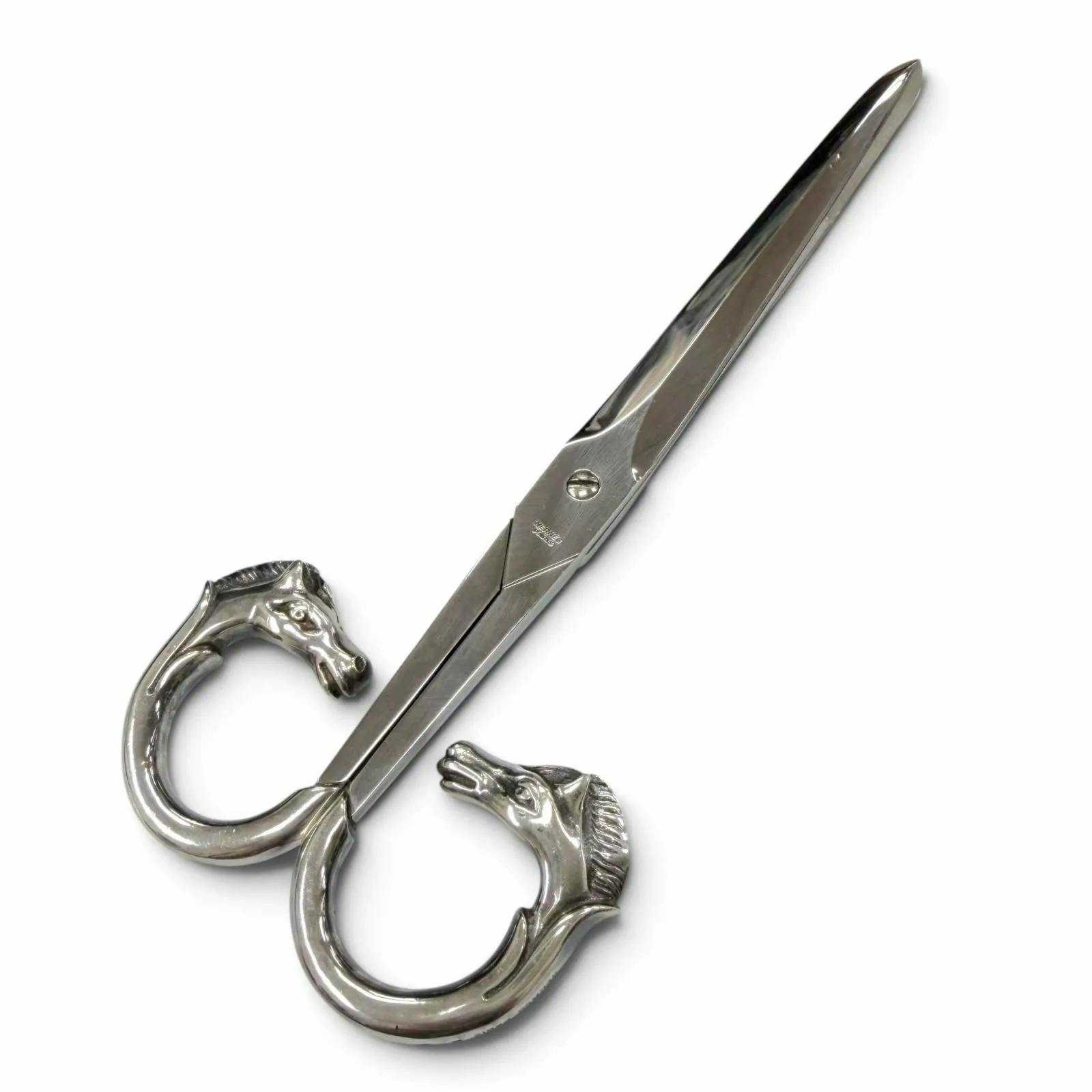 Silver Hermes horse-head handle craft scissors with long blades shown on a white background.