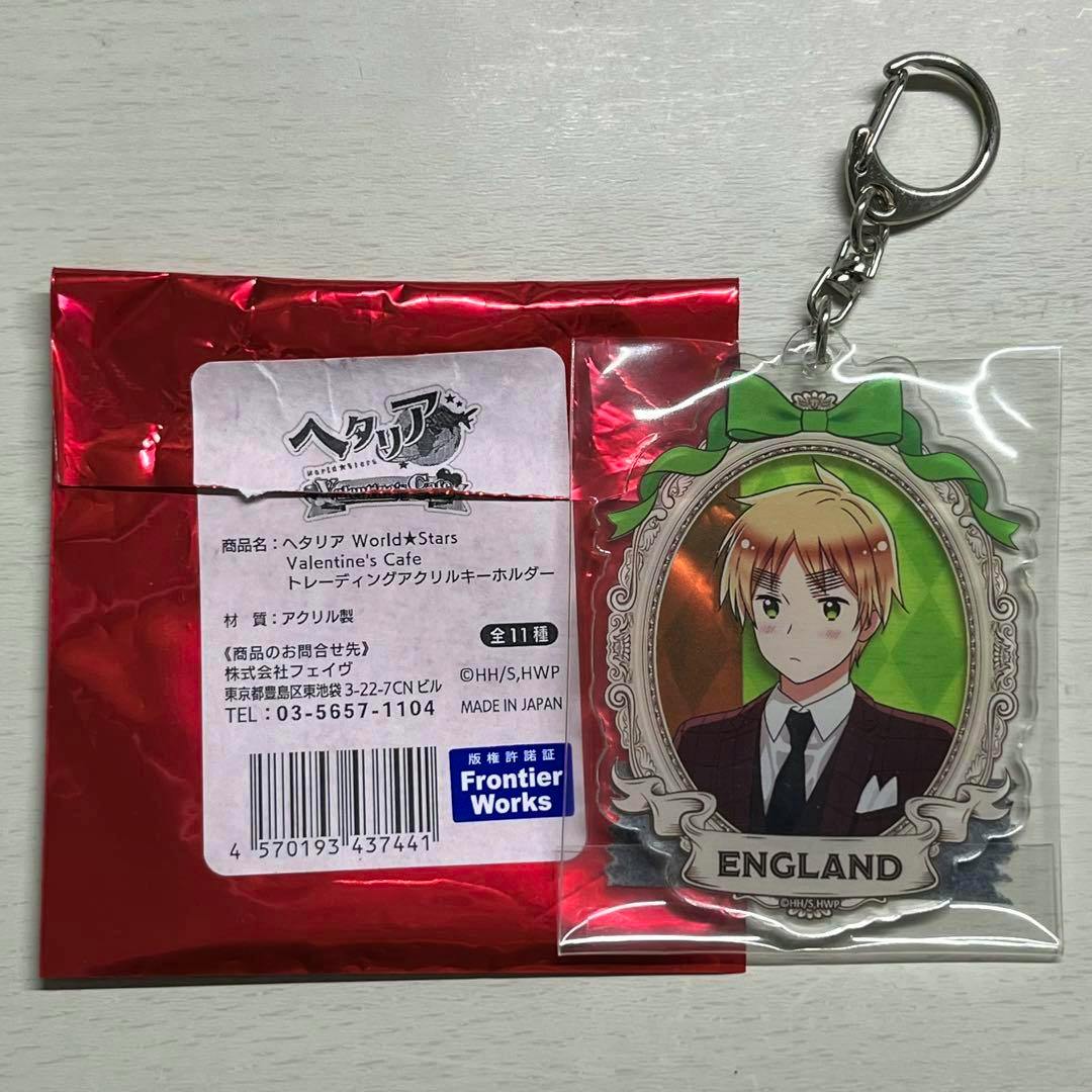 A Hetalia “England” acrylic keychain in a clear plastic sleeve shown beside its red foil backing and product label.