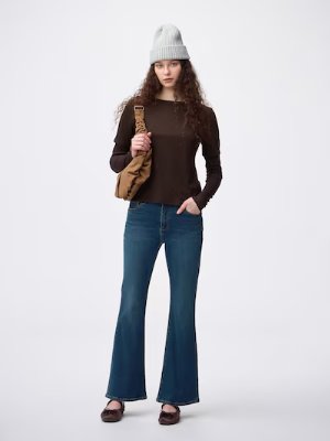 Model wearing the women's high-rise straight jeans, front view against a white background.