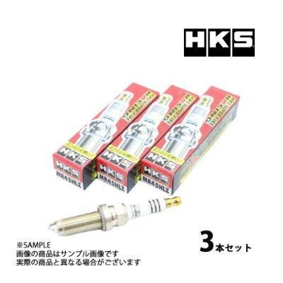 Three boxed HKS spark plugs and one loose spark plug displayed (set of 3).