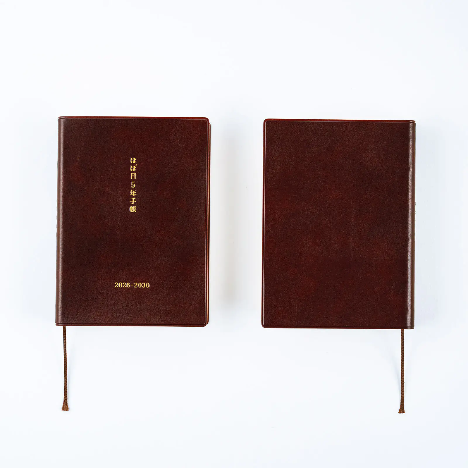 Two A6-sized Hobonichi 5-Year Techo notebooks (2026–2030) showing front and back covers on a white background.