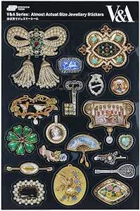 Sheet of paper stickers showing various jewelry and brooch designs on a black background.