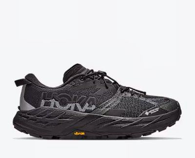 Side view of a black Speedgoat 7 GTX trail running shoe on a plain background.