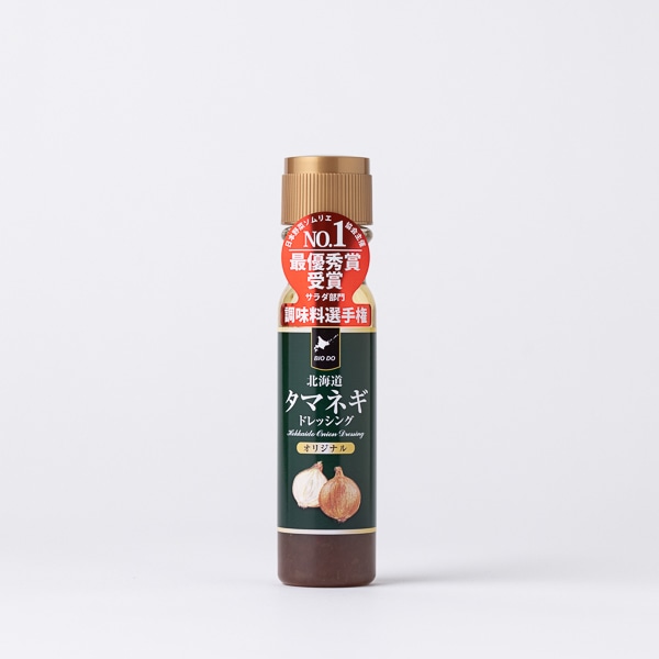 Front-facing bottle of Hokkaido onion dressing (200ml) with a dark green label and gold cap on a white background.