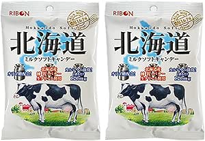 Two packaged bags of Hokkaido milk soft candy showing the product packaging with a cow illustration on the front.