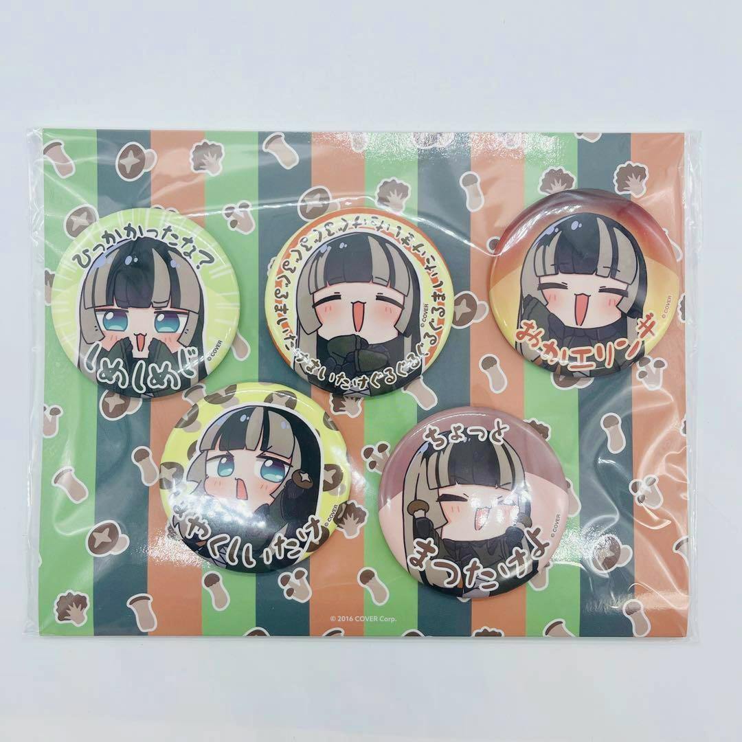 Five round can badges with Hololive character artwork on a striped backing card inside plastic packaging.