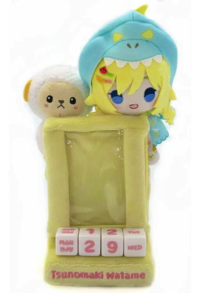 Plush perpetual calendar featuring a Tsunomaki Watame character plush and a small sheep plush with a yellow frame and date cubes.