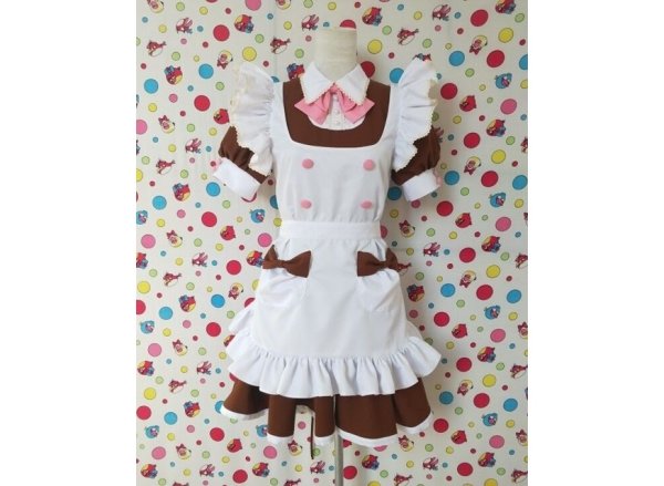 Front view of a brown maid-style cosplay dress on a mannequin with a white apron and pink bow.
