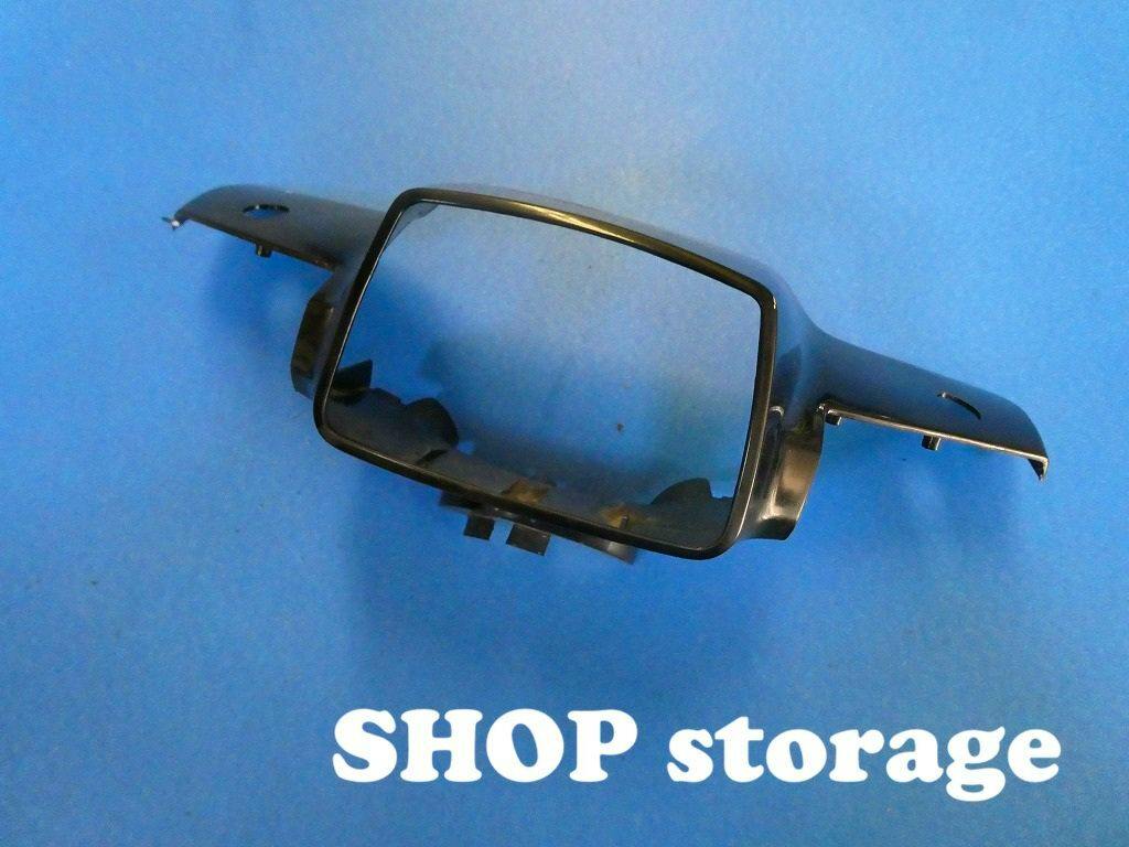 Black motorbike headlight cowl (light cowl) shown on a blue background with a 'SHOP storage' watermark.