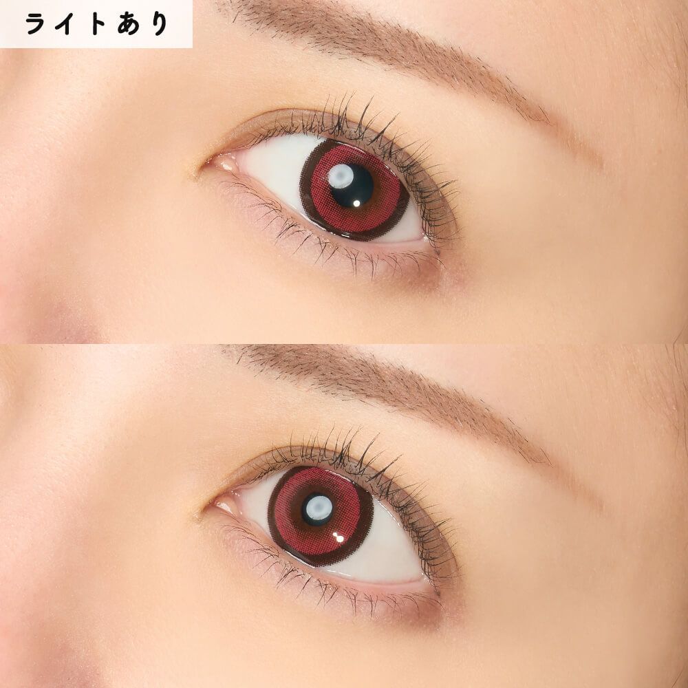 Close-up of a person's eyes wearing red Honey Kiss contact lenses.