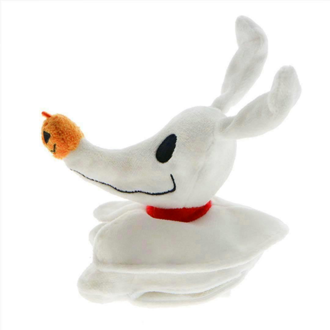 White Zero plush accessory with an orange pumpkin-like nose and a red collar shown against a white background.