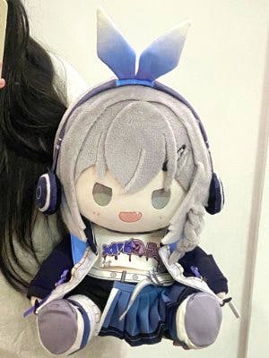 A 40cm Silver Wolf plush (Honkai: Star Rail) held by a person against a plain background.