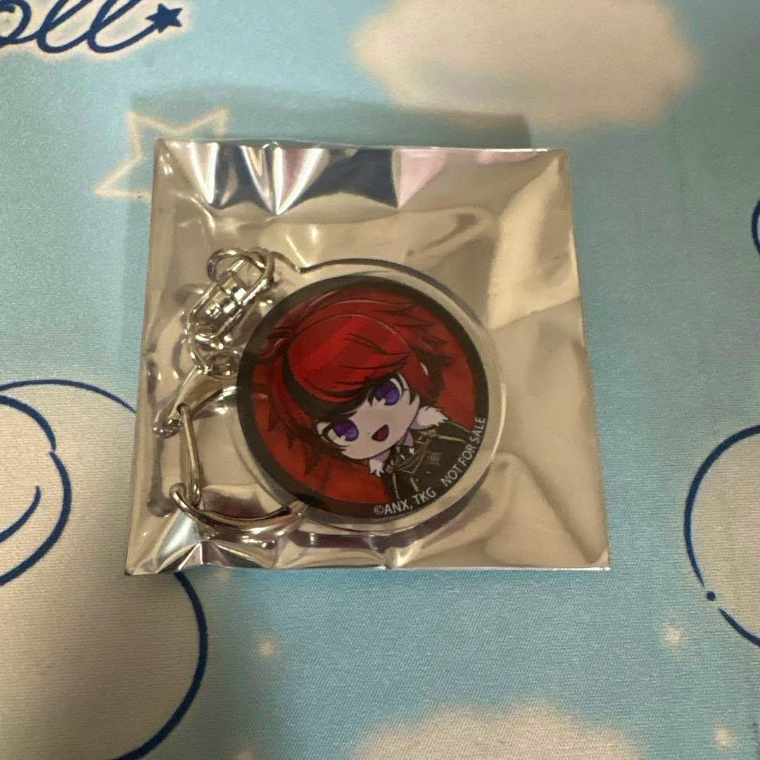 A HUNDRED LINE 澄野拓海 acrylic keychain in sealed foil packaging showing a round charm with chibi red-haired character art and attached metal ring.