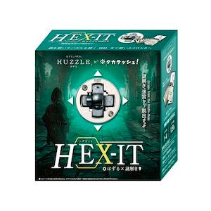 Boxed packaging of the metal toy puzzle HEX-IT showing the front artwork and product name.