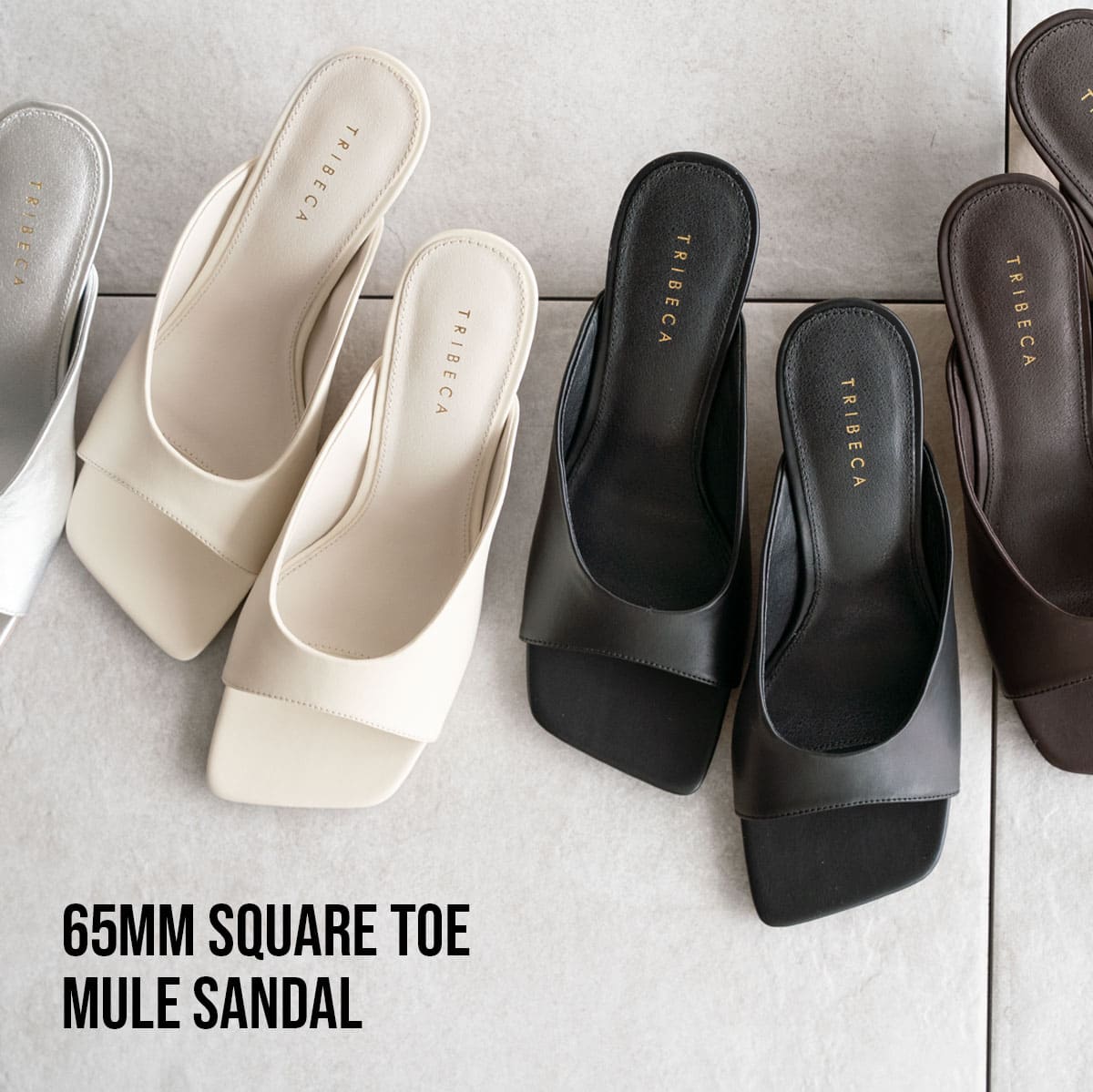 Top-down photo of several square-toe mule sandals in black, white, brown, and silver arranged on a gray surface.