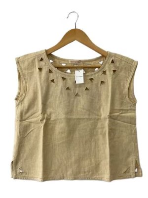 Beige cotton sleeveless singlet with triangular cutout details shown on a wooden hanger.